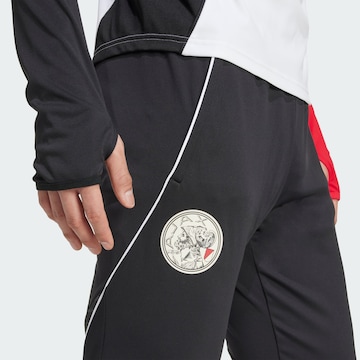 Coupe slim Pantalon de sport 'Ajax Tiro 25 Competition' ADIDAS PERFORMANCE en noir