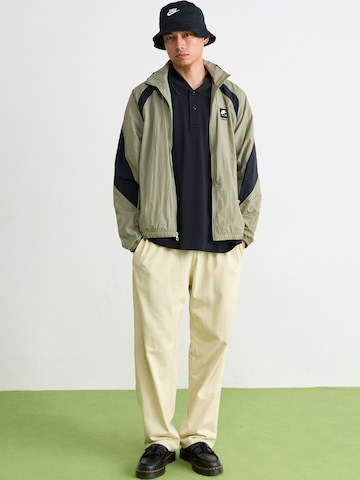 žalia Nike Sportswear Demisezoninė striukė 'AIR'