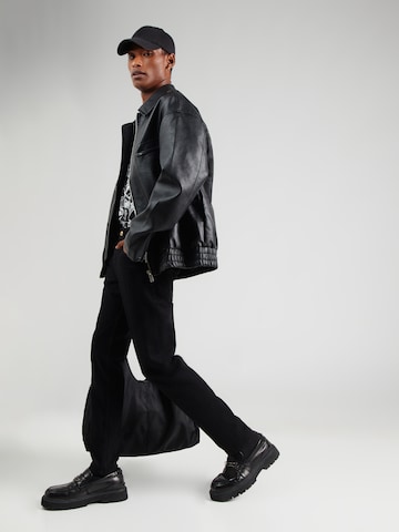 Slimfit Jeans 'Dundee' di Versace Jeans Couture in nero