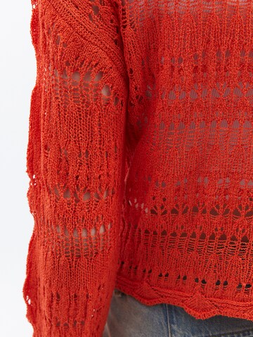 Pull-over OXXO en orange