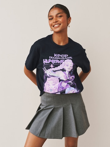 Next Oversized paita 'Kpop Demon Hunters' värissä musta: etupuoli