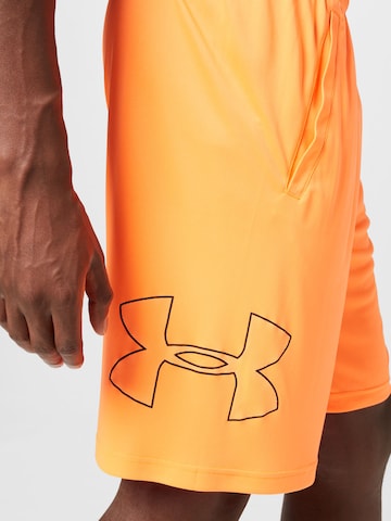 UNDER ARMOUR Voľný strih Športové nohavice - oranžová