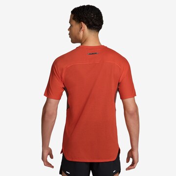NIKE Funktionsshirt 'Dfadv Solar' in Orange