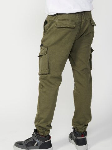 KOROSHI Tapered Cargobroek in Groen