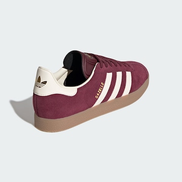 Baskets basses 'Gazelle' ADIDAS ORIGINALS en rouge