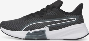 PUMA Athletic Shoes in Black: front