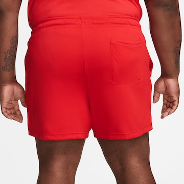 Nike Sportswear Regular Workout Pants in Red