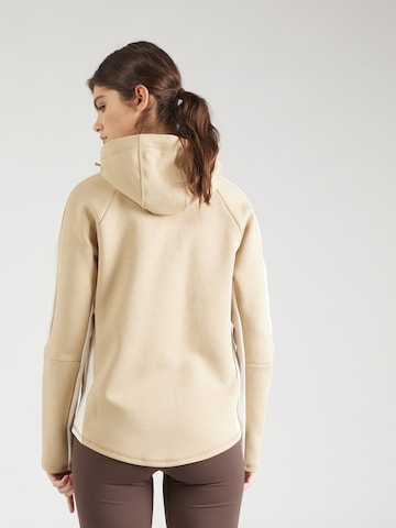 PUMA Athletic Zip-Up Hoodie 'EVOSTRIPE' in Brown