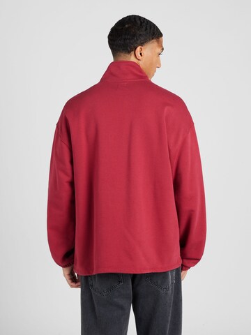 LEVI'S ® Sweatshirt 'RLXD Graphic 1/4 Zip Pch' in Red