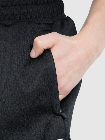Smilodox Loose fit Sports trousers ' Classic Ripp ' in Black