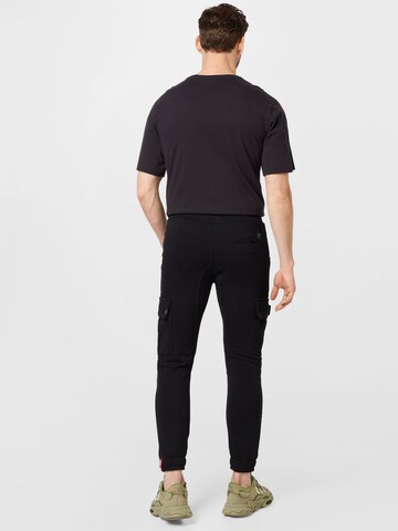 ALPHA INDUSTRIES Tapered Cargo trousers in Black