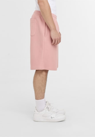 Karl Kani Regular Shorts in Pink
