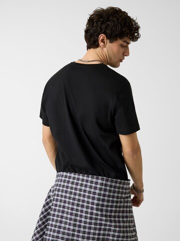 GUESS T-Shirt in Schwarz