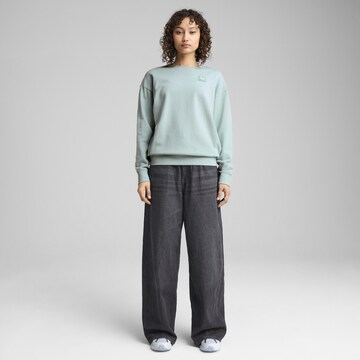 Sweat-shirt 'Ess Elevated' PUMA en vert
