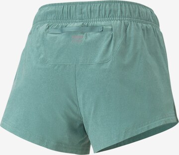 PUMA Regular Sports trousers in Green