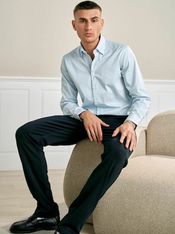 Coupe regular Chemise ' The Original ' TEESHOPPEN en bleu