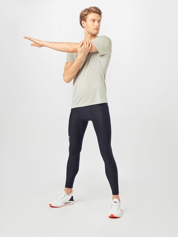 UNDER ARMOUR Skinny Sportovní kalhoty – černá