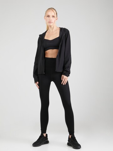 NIKE Skinny Sporthose in Schwarz