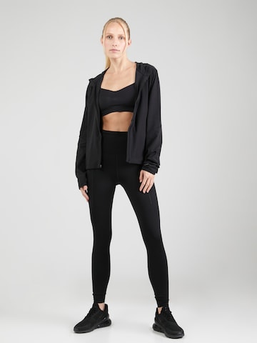 NIKE Skinny Spodnie sportowe w kolorze czarny