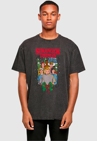 ABSOLUTE CULT Shirt 'Stranger Things - Christmas Poster' in Black: front