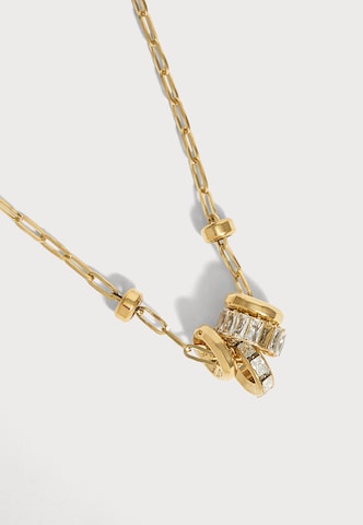 GUESS - Cadena en oro