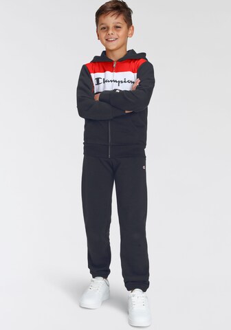 Champion Authentic Athletic Apparel Tracksuit in Blue