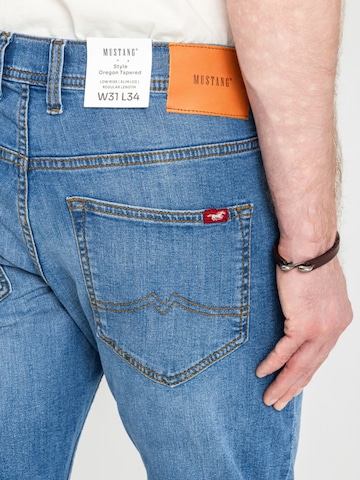 Tapered Jeans 'Mustang Style Oregon Tapered Denim Blue 1018014 5000 682' di MUSTANG in blu