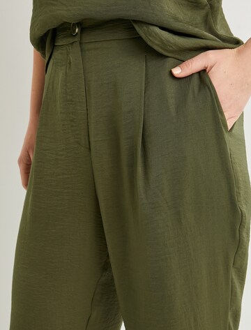 Koton Loose fit Pleat-front trousers in Green