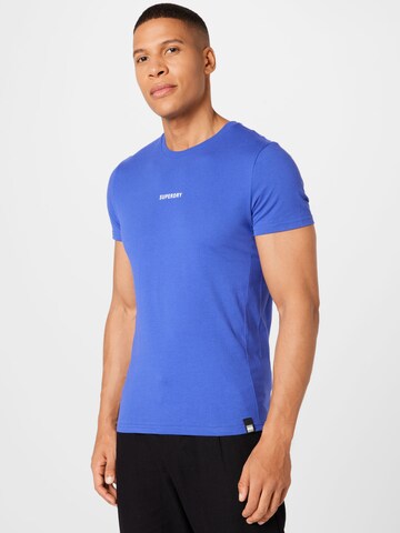 SuperdryTehnička sportska majica - plava boja: prednji dio