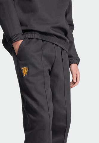 Loosefit Pantalon 'Manchester United Terrace Icons' ADIDAS ORIGINALS en noir