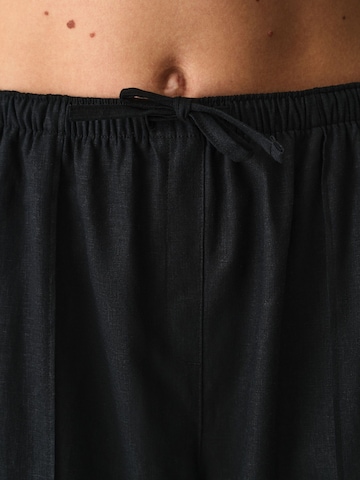 Penti Wide Leg Sporthose 'Jogginghose'‌‌‌‌‌‌‌‌‌‌ in Schwarz