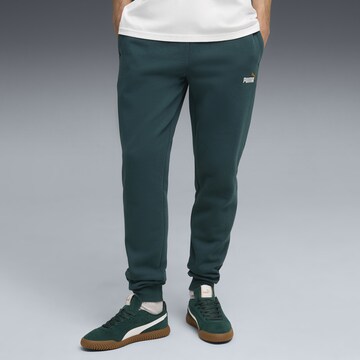 PUMA Tapered Workout Pants 'Essentials 2 No.1' in Green: front