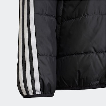 ADIDAS ORIGINALS Välikausitakki 'Adicolor' värissä musta