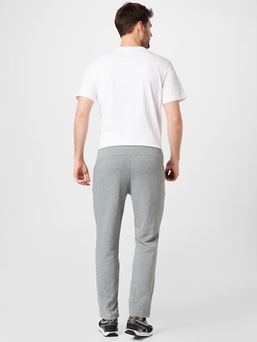 Regular Pantalon de sport 'Essentials' PUMA en gris