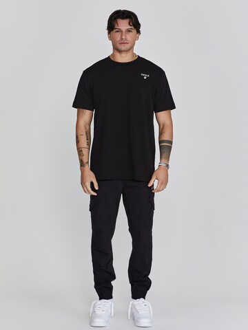 Tapered Pantaloni cargo di SikSilk in nero