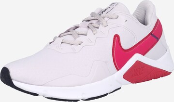 NIKE Buty sportowe 'Legend Essential 2' w kolorze beżowy: przód