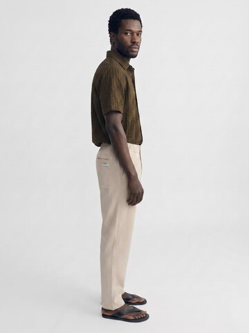 Thinking MU Baggy Broek 'TRAVEL PANTS LIGHT BEIGE' in Beige