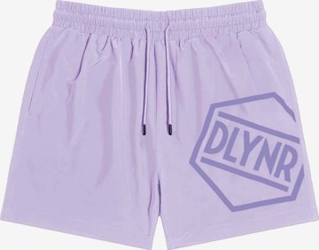 DOLLY NOIRE Board Shorts in Purple: front