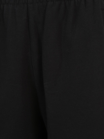 Tapered Pantaloni di ADIDAS ORIGINALS in nero