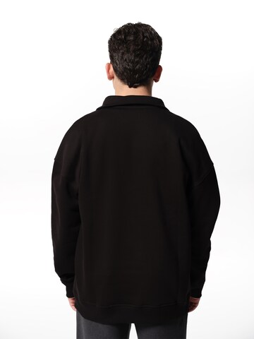 ABOUT YOU x Jaime Lorente Sweatshirt 'Sascha' in Black