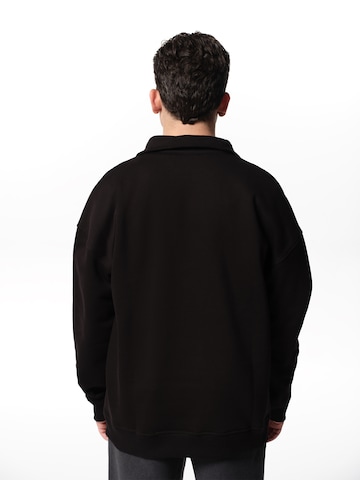 ABOUT YOU x Jaime Lorente Sweatshirt 'Sascha' in Black