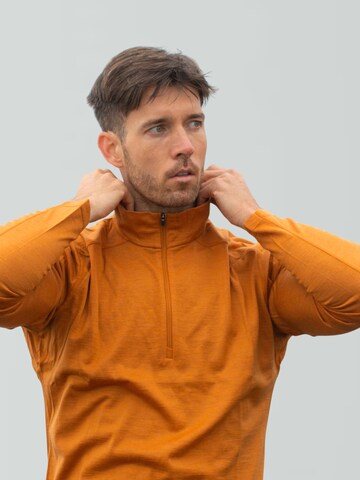 Alpenwert Shirt 'Zip Longsleeve Herren 100% Merino' in Orange