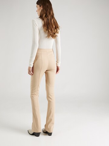 Flared Pantaloni di PATRIZIA PEPE in beige