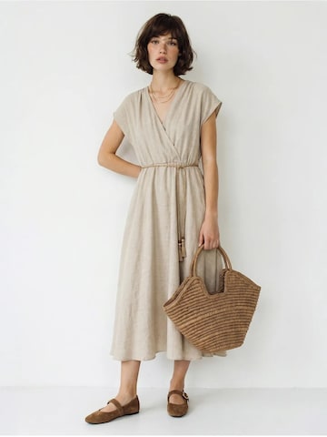 Abito estivo di Bianco Lucci in beige: frontale