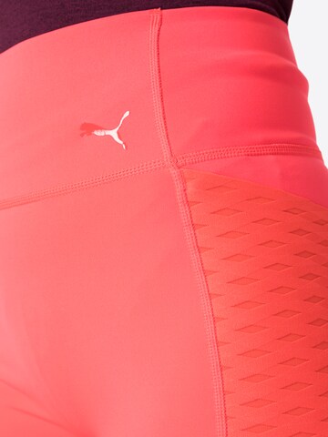 PUMA Skinny Sporthose in Orange