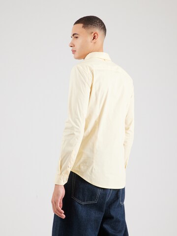 Slim fit Cămașă de la Tommy Jeans pe galben