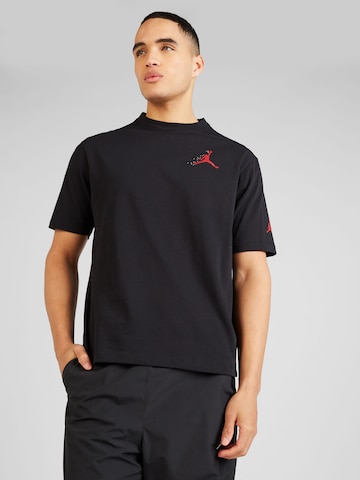 Jordan Тениска 'ESS' в черно: отпред