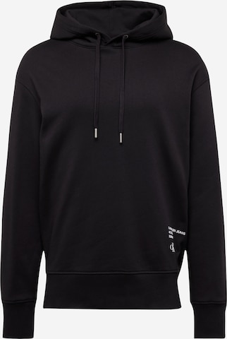 Sweat-shirt Calvin Klein Jeans en noir : devant