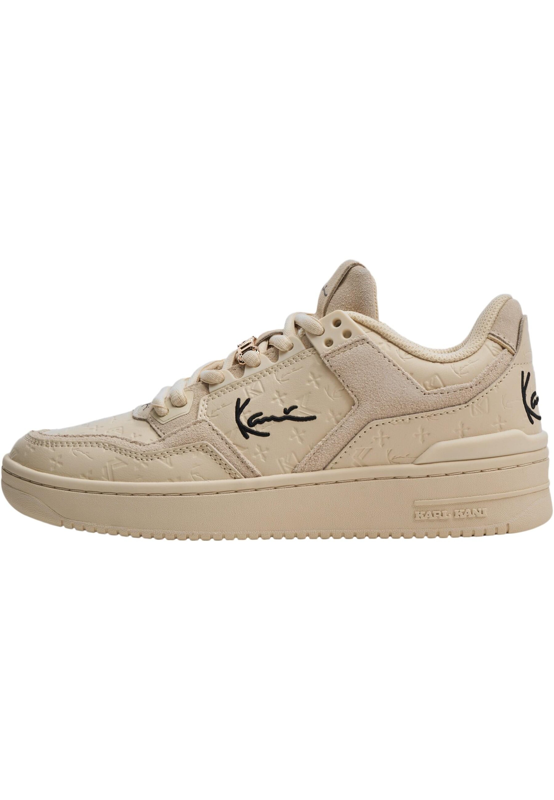 Baskets basses Karl Kani en beige : devant