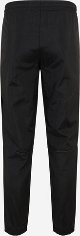 Tapered Pantaloni 'Reveal Material Mix' di ADIDAS ORIGINALS in nero